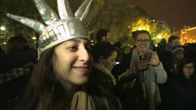 Woman wearing Statue of Liberty hat