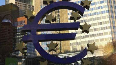 The euro symbol in front of the European Central Bank in Frankfurt