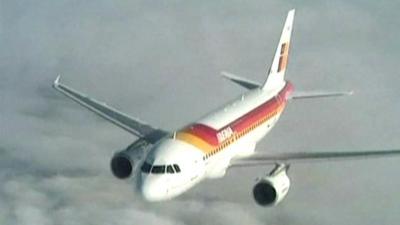 An Iberia airline plane in flight