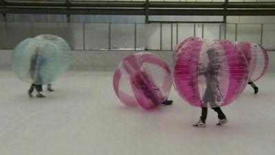 Children playing ice football