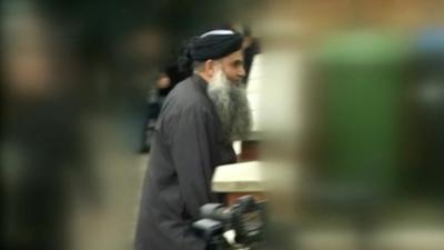 Abu Qatada arriving home