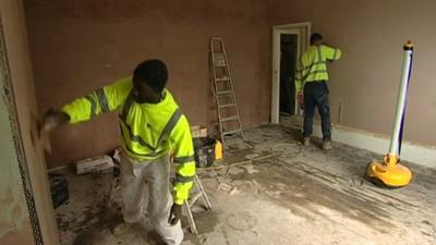 Men renovating a house