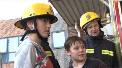 Young carers and a firefighter