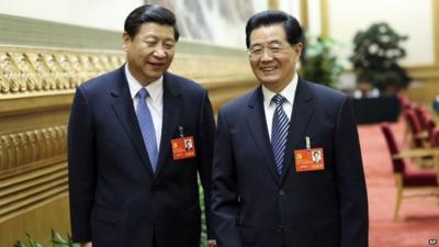 Outgoing and incoming leaders Hu Jintao (R) and Xi Jinping (L) pictured on 7 November 2012