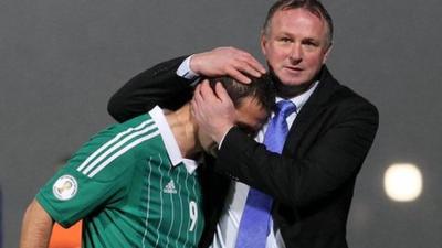 Northern Ireland goalscorer David Healy with manager Michael O'Neill