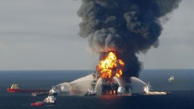 Fire boat response crews battle the blazing remnants of the offshore oil rig Deepwater Horizon, off Louisiana, in April 21, 2010