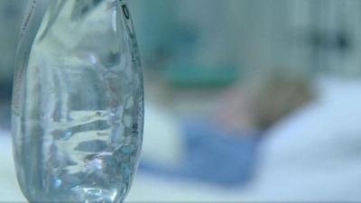 Patient with a fluid drip