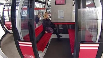 Commuter in cable car