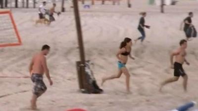 People on the beach fled as sirens sounded in Tel Aviv on Saturday