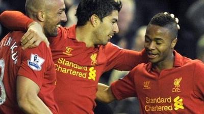 Liverpool's Jose Enrique, Luis Suarez and Raheem Sterling