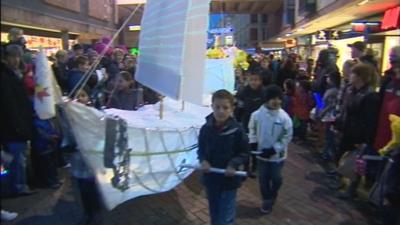 A Christmas lights parade in Gloucester city centre