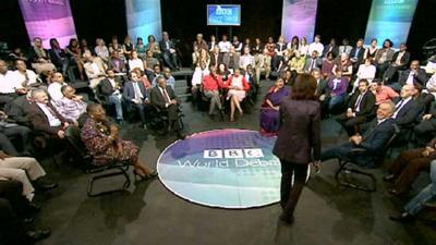 Zeinab Badawi with guests and studio audience