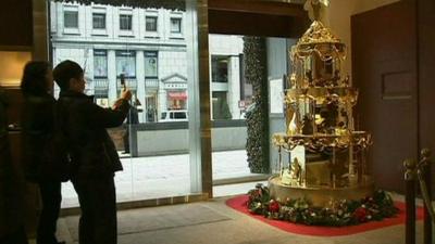 The golden Christmas tree in the store in Tokyo