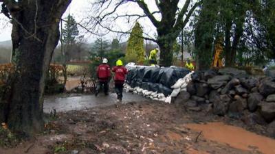 Building a wall of sandbags