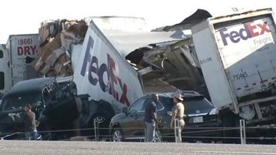 Pile-up of cars and lorries