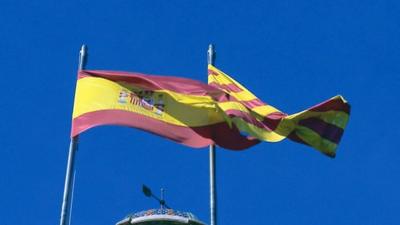 Spanish and Catalan flags