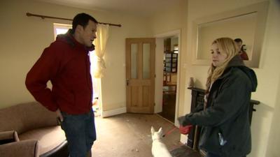 Giles Latcham and Jenny Robinson inside a flood-hit house