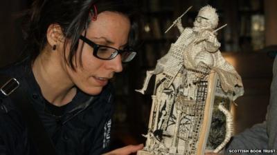 Emma Lister finding first book sculpture