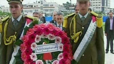 A wreath is laid after Yasser Arafat's tomb was resealed