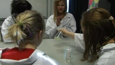 Finnish girls conducting science experiment