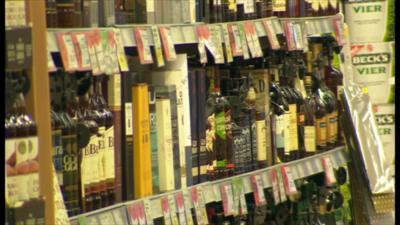 Bottles of alcohol in supermarket