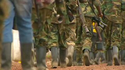 Rebel fighters in DR Congo