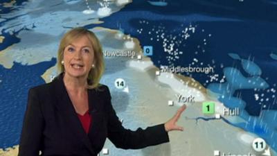 Carol Kirkwood with weather map