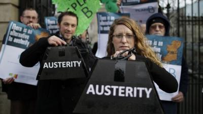 Protestors from "Claiming Our Future" outside Leinster House, Dublin