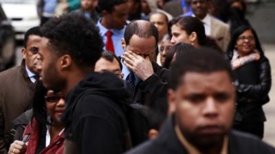 A line of jobseekers at a career fair in New York on 12 April 2012