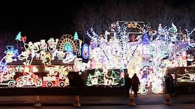 House and grounds covered with Christmas lights at Melksham, Wiltshire