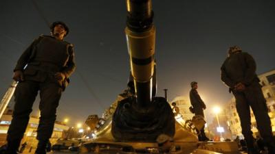 Tanks are guarding the presidential palace in Cario