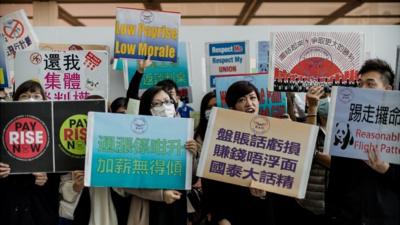 Cathay Pacific cabin crew protesting