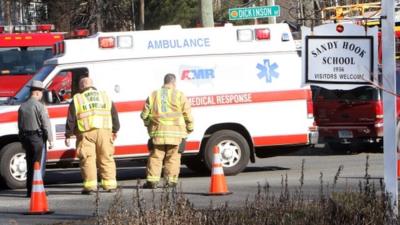 Emergency crews outside Sandy Hook elementary school in Connecticut