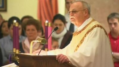 A vigil at a church in Newtown, Connecticut