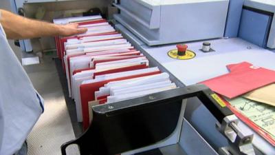 Letters sorted at a Royal Mail sorting office