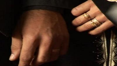 A couple registering their marriage in a Kabul court