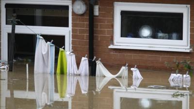 Washing line in floodwater