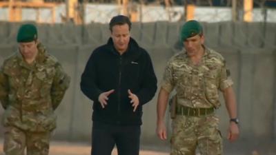 David Cameron with British soldiers in Afghanistan