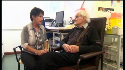 Diabetes nurse with patient