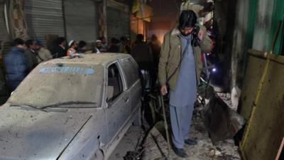 Man surveys damage in Peshawar