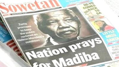 Newspaper with picture of Nelson Mandela