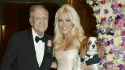 Hugh Hefner with his new wife Crystal Harris and her dog Charlie