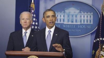 President Barack Obama, with Vice-President Joe Biden at his side