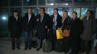 Eric Schmidt (2nd left) and Bill Richardson (3rd left) after arriving in North Korea