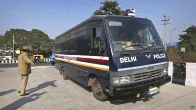 Police van believed to be carrying the accused