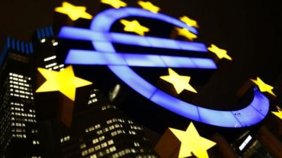 An illuminated euro sign