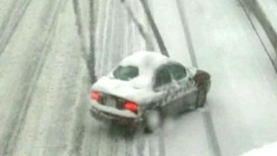 Car sliding on snowy road