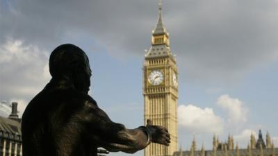 Statue of Nelson Mandela overlooks Parliament