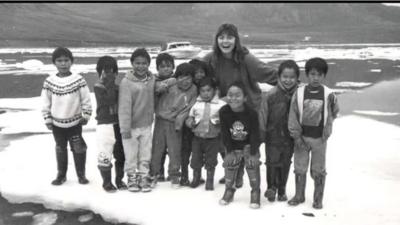 Galya with children standing on ice