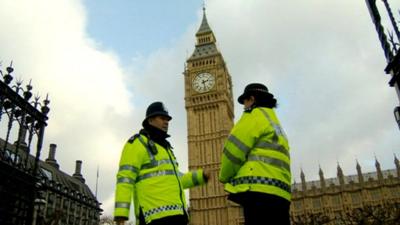 Police officers in front of Big Ben